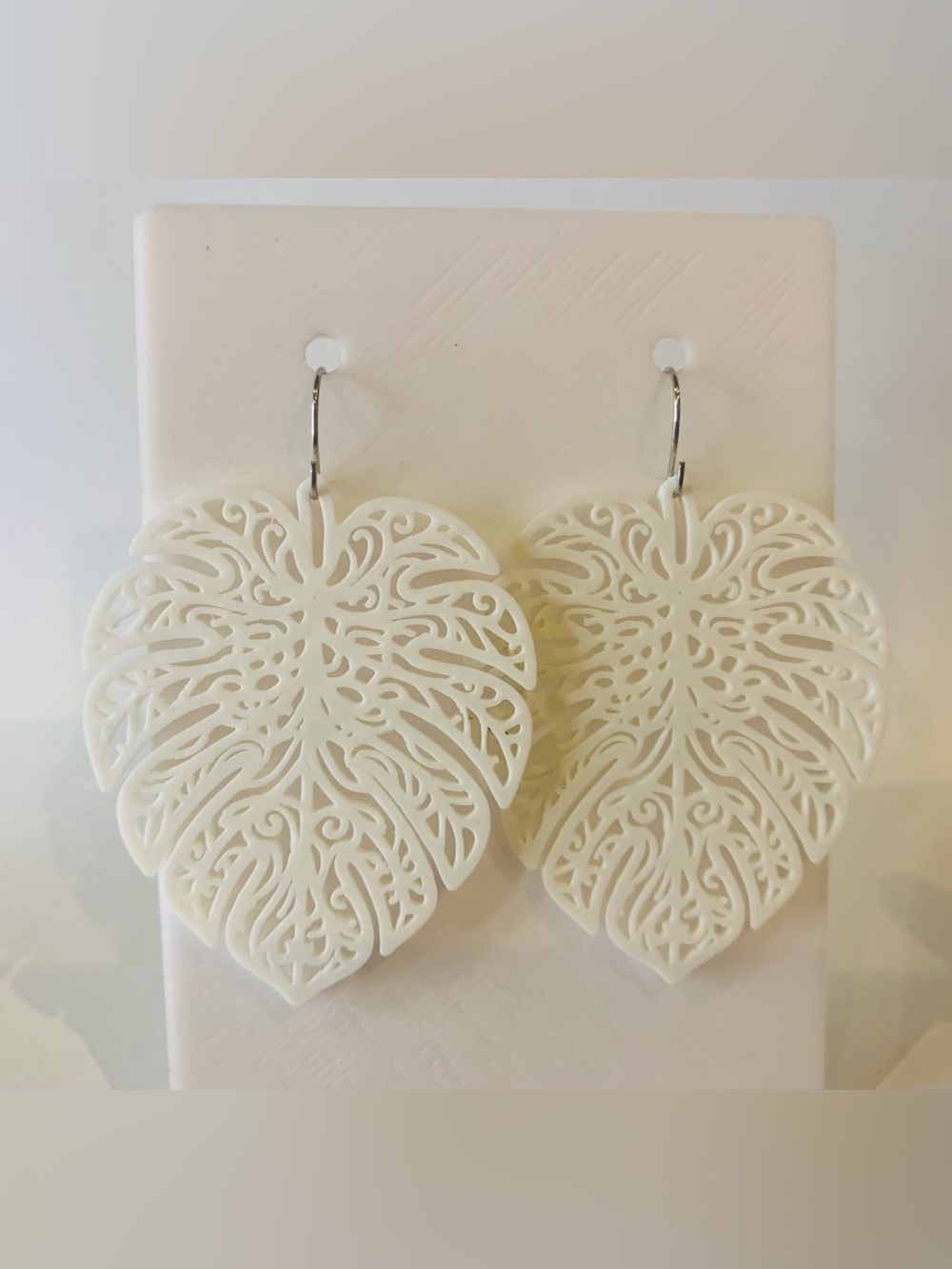 White Filigree Monstera Leaf Earrings by